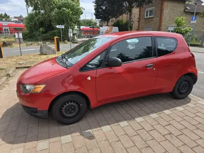 Gebraucht Mitsubishi Colt 75 PS (55 kW) 2009 Rot Kleinwagen