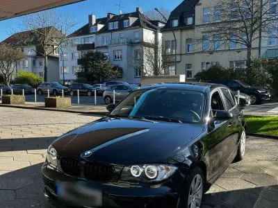 Second-hand BMW 116 122 CP (89 kW) 2008 Negru Hatchback
