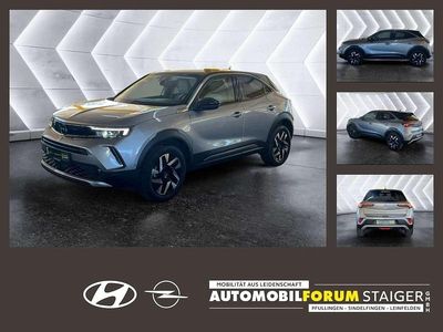 Gebraucht Opel Mokka Elegance 101 PS (74 kW) 2023 Kontrast grau/quarz silber SUV