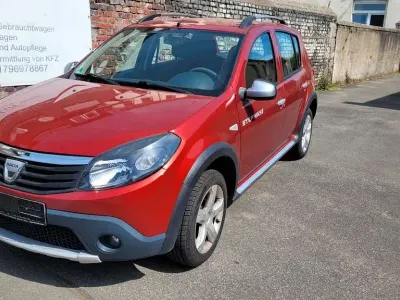 Second-hand Dacia Sandero Stepway 87 CP (63 kW) 2010 Roșu Berlinǎ