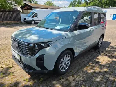 Gebraucht Ford Tourneo Courier Titanium 125 PS (91 kW) 2025 Grau Van / Kleinbus