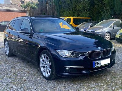 Second-hand BMW 330 Luxury Line 258 CP (189 kW) 2013 Albastru Break
