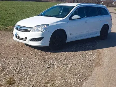 Używany Opel Astra OPC 116 KM (85 kW) 2010 Biały Kombi