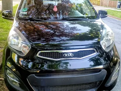Gebraucht Kia Picanto 69 PS (50 kW) 2013 Schwarz Kleinwagen