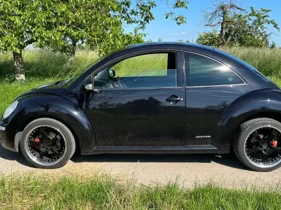 Gebraucht VW New Beetle United 131 PS (96 kW) 2009 Schwarz Kleinwagen