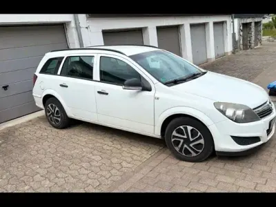 Używany Opel Astra 120 KM (88 kW) 2009 Biały Kombi