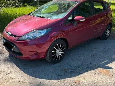 Gebraucht Ford Fiesta 60 PS (44 kW) 2009 Rot Kleinwagen
