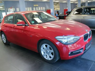 Second-hand BMW 116 Sport Line 136 CP (100 kW) 2013 Roșu Hatchback