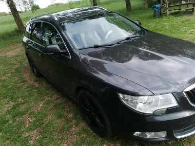 Używany Skoda Superb 160 KM (117 kW) 2012 Brązowy Kombi