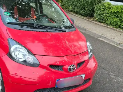 Gebraucht Toyota Aygo 68 PS (50 kW) 2008 Rot Kleinwagen