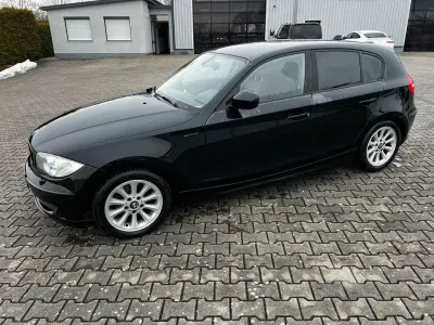 Gebraucht BMW 116 122 PS (89 kW) 2011 Schwarz Kleinwagen