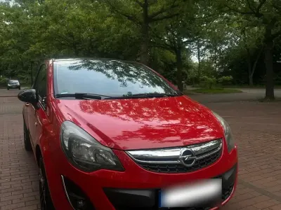 Gebraucht Opel Corsa 101 PS (74 kW) 2013 Rot Kleinwagen