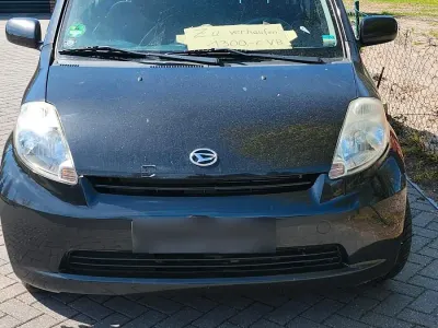 Gebraucht Daihatsu Sirion 64 PS (47 kW) 2007 Schwarz Kleinwagen