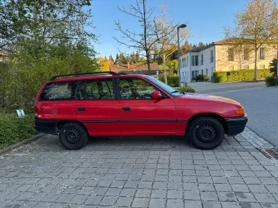 Second-hand Opel Astra 71 CP (52 kW) 1994 Roșu Break