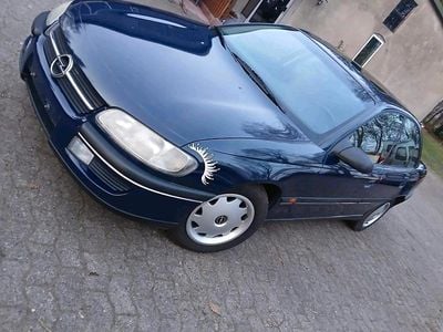 Second-hand Opel Omega 115 CP (84 kW) 1997 Albastru Berlinǎ