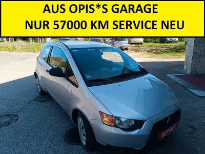 Gebraucht Mitsubishi Colt 75 PS (55 kW) 2009 Haagsilber (m) Kleinwagen