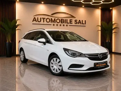Używany Opel Astra Business 136 KM (100 kW) 2019 Biały Kombi