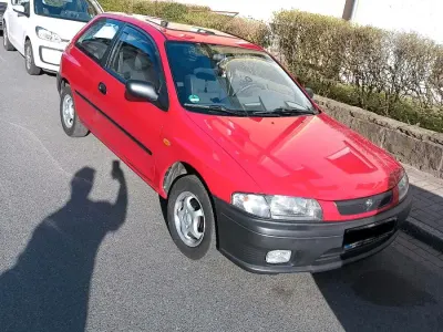 Gebraucht Mazda 323F 73 PS (53 kW) 1997 Rot Kleinwagen