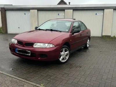 Gebraucht Mitsubishi Carisma 116 PS (85 kW) 1998 Rot Limousine