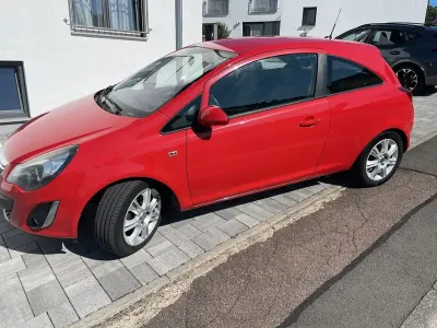 Gebraucht Opel Corsa Innovation 69 PS (50 kW) 2011 Rot Kleinwagen