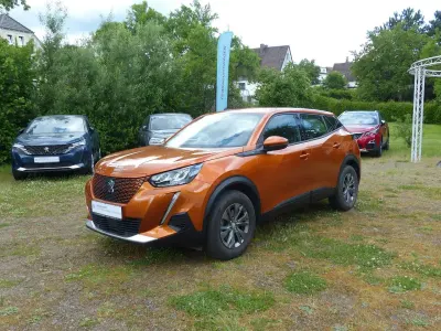 Gebraucht Peugeot e-2008 Active 100 kW (136 PS) 2021 Orangefusion SUV