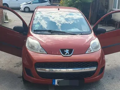 Gebraucht Peugeot 107 Filou 68 PS (50 kW) 2009 Orange Kleinwagen
