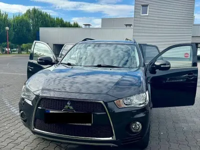Gebraucht Mitsubishi Outlander Motion 156 PS (114 kW) 2012 Schwarz SUV