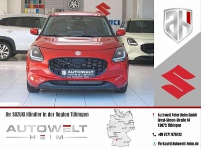 Gebraucht Suzuki Swift 83 PS (61 kW) 2024 Burning red pearl metallic Kleinwagen