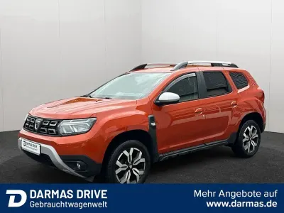 Używany Dacia Duster Prestige 91 KM (66 kW) 2022 Pomarańczowy SUV