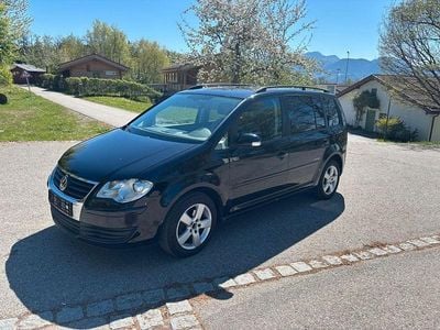 Second-hand VW Touran United 140 CP (102 kW) 2007 Negru Monovolum