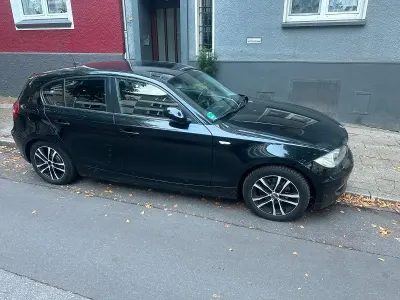 Usata BMW 116 122 CV (89 kW) 2009 Nero Utilitaria
