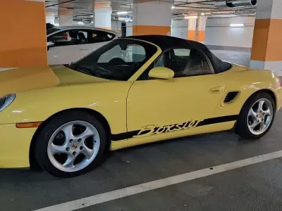 Gebraucht Porsche 986 Boxster 204 PS (150 kW) 1997 Gelb Cabrio