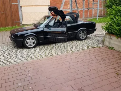 Gebraucht BMW 318 Performance 116 PS (85 kW) 1991 Schwarz Cabrio