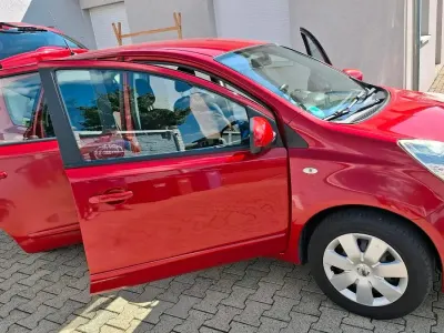Gebraucht Nissan Note 88 PS (64 kW) 2009 Rot Kleinwagen
