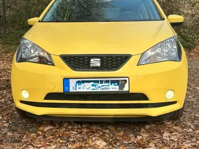 Używany Seat Mii 60 KM (44 kW) 2013 Żółty Hatchback