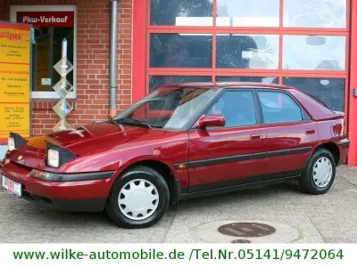 Gebraucht Mazda 323 88 PS (64 kW) 1994 Rot Limousine