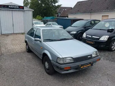 Gebraucht Mazda 323 60 PS (44 kW) 1989 Grau Kleinwagen