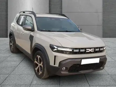 Gebraucht Dacia Duster Journey 141 PS (103 kW) 2024 Sandstonebeige (metallic) SUV