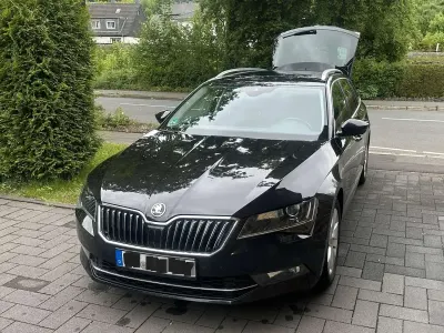 Używany Skoda Superb Style 190 KM (139 kW) 2017 Czarny Kombi