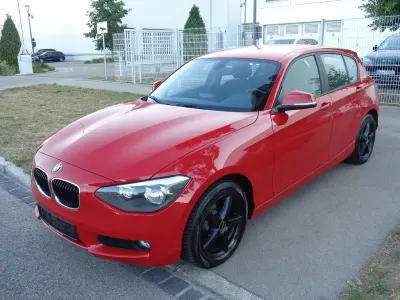 Gebraucht BMW 116 Comfort Edition 136 PS (100 kW) 2012 Rot Kleinwagen