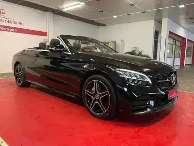 Gebraucht Mercedes C180 AMG line 156 PS (114 kW) 2018 Obsidianschwarz Cabrio