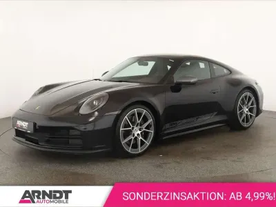 Gebraucht Porsche 911 Carrera T 394 PS (289 kW) 2025 Tiefschwarzmetallic Coupé