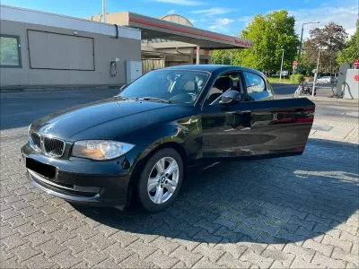 Gebraucht BMW 116 122 PS (89 kW) 2009 Schwarz Kleinwagen