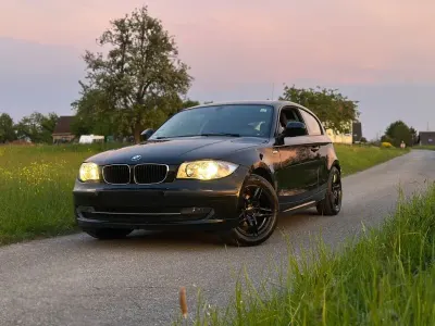 Usata BMW 116 122 CV (89 kW) 2010 Nero Utilitaria