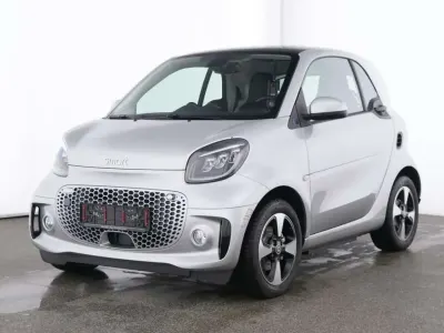 Gebraucht Smart ForTwo Coupé Passion Exclusive 60 kW (82 PS) 2024 Silber (cool silver (metallic) (silber)) Coupé