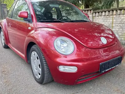 Gebraucht VW New Beetle 116 PS (85 kW) 1999 Canyonred perleffekt Kleinwagen