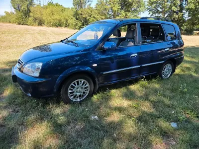Gebraucht Kia Carens 126 PS (92 kW) 2003 Blau Van / Kleinbus