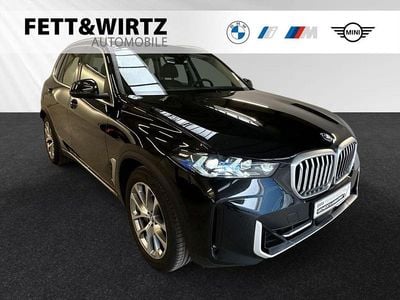 Gebraucht BMW X5 Sport Line 489 PS (359 kW) 2024 Black sapphire metallic SUV