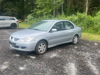 Gebraucht Mitsubishi Lancer 98 PS (72 kW) 2003 Silber Limousine