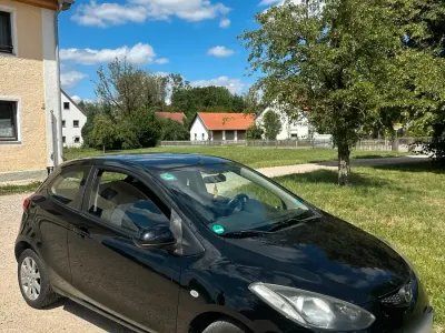 Gebraucht Mazda 2 75 PS (55 kW) 2010 Schwarz Kleinwagen